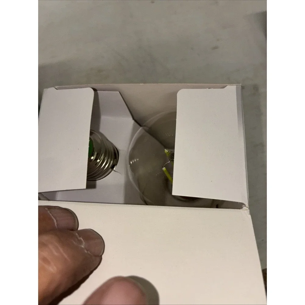 two packs of green great value LED 60 watt light bulbs A19 4 Bulbs NIB